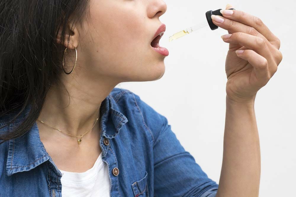 A woman taking CBD oil sublingually and the impact on the duration of the effects of CBD